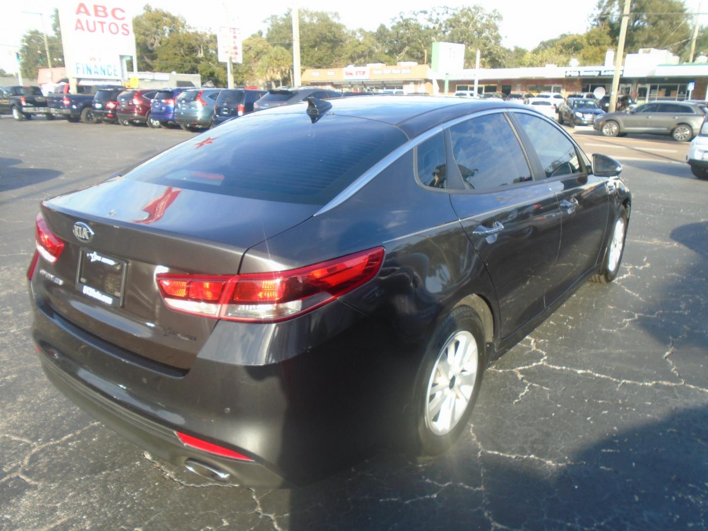 2018 Kia Optima (KNAGT4L31J5) with an 2.4L L4 DOHC 16V engine, 6-Speed Automatic transmission, located at 6112 N Florida Avenue, Tampa, FL, 33604, (888) 521-5131, 27.954929, -82.459534 - Photo#3